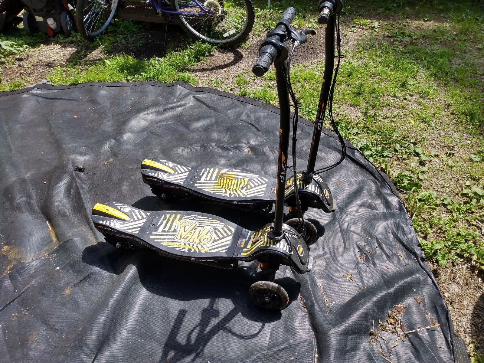 2 eZip EZ3 Nano Carver Electric Scooters With 1 Charging Cable