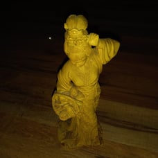 Handcrafted wooden Japanese statue