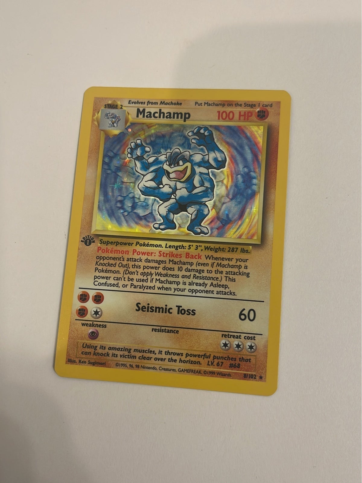 Pokemon Machamp Base Set 1st Edition revised with Shadowed Borders