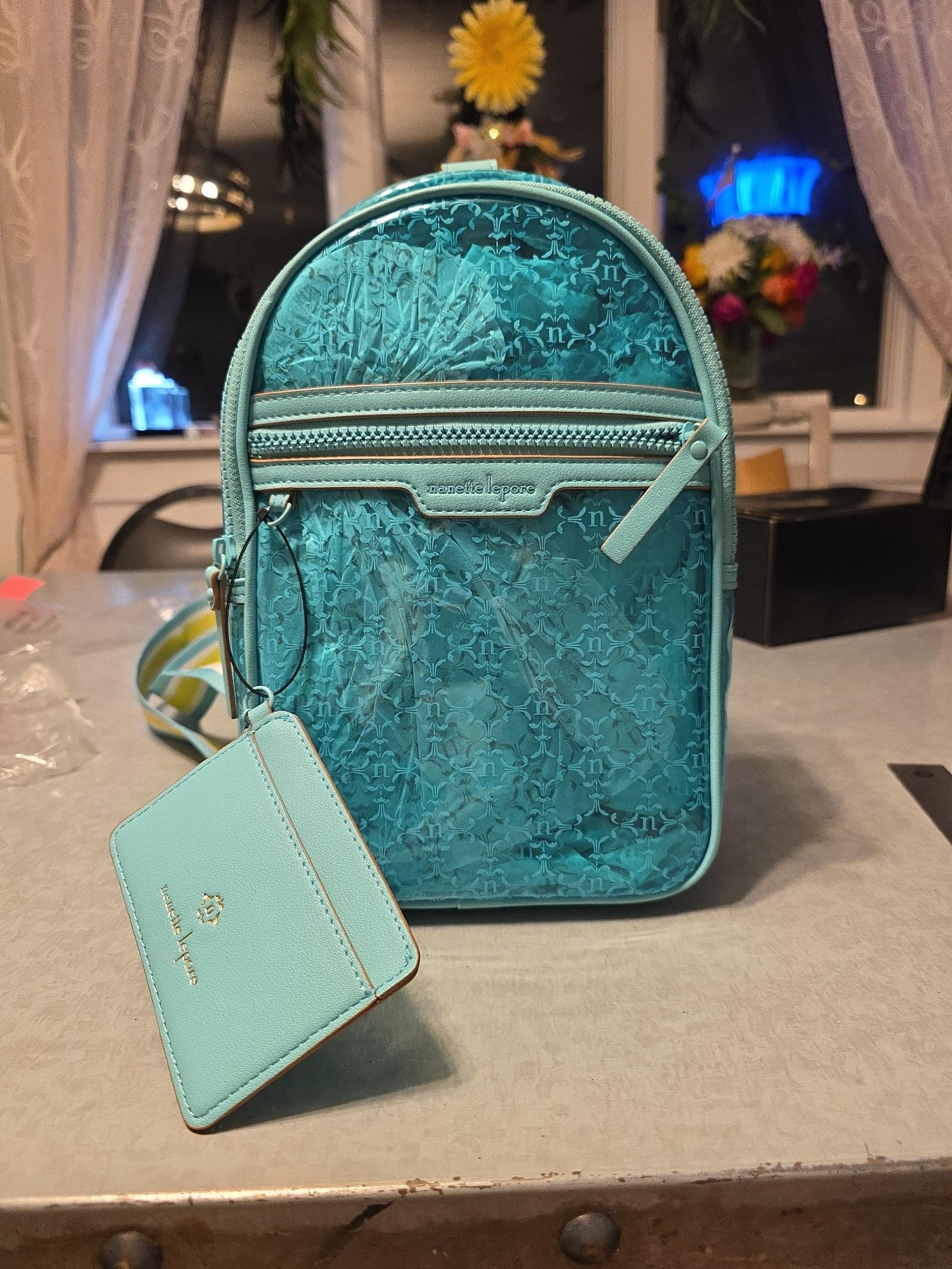 Nanette Lepore clear kourt logo sling with cardcase.