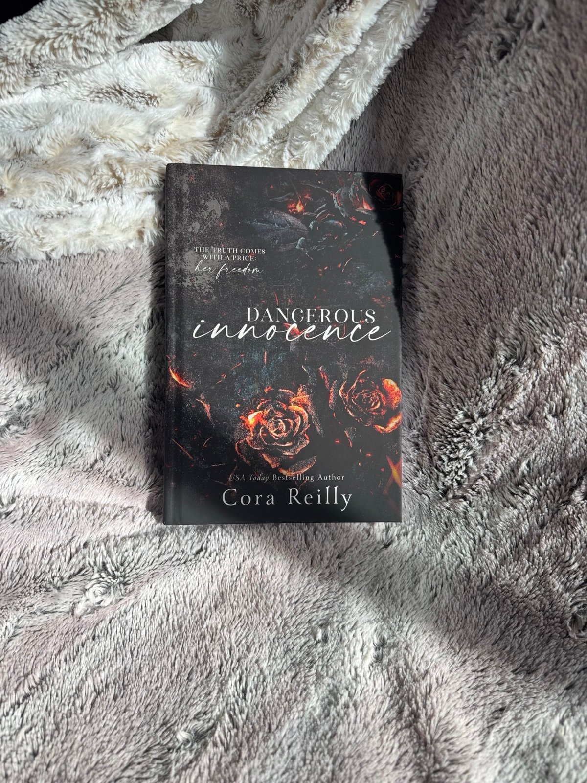 Signed Special Edition copy of Dangerous Innocence by Cora Reilly