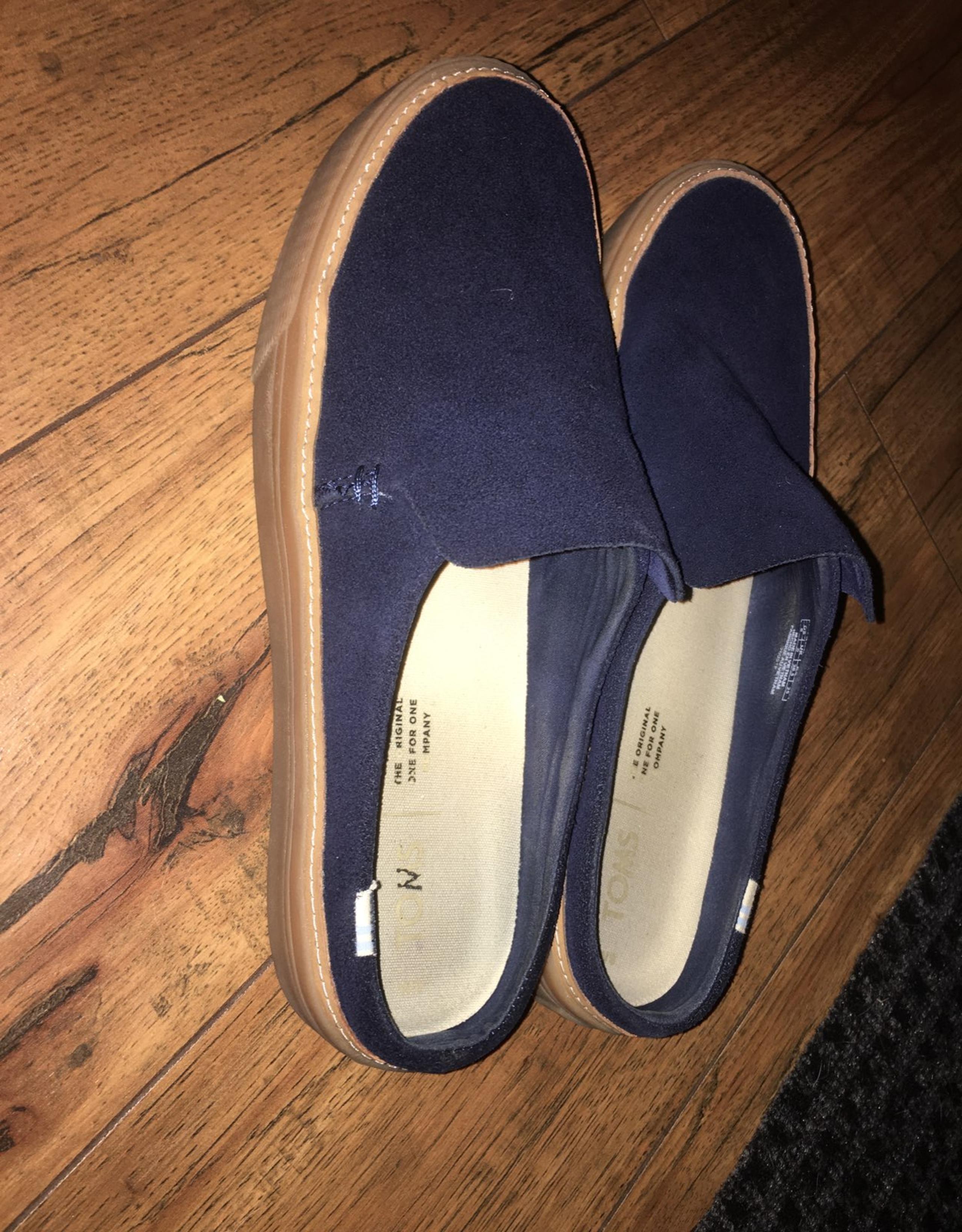 Dark blue slip on suede toms