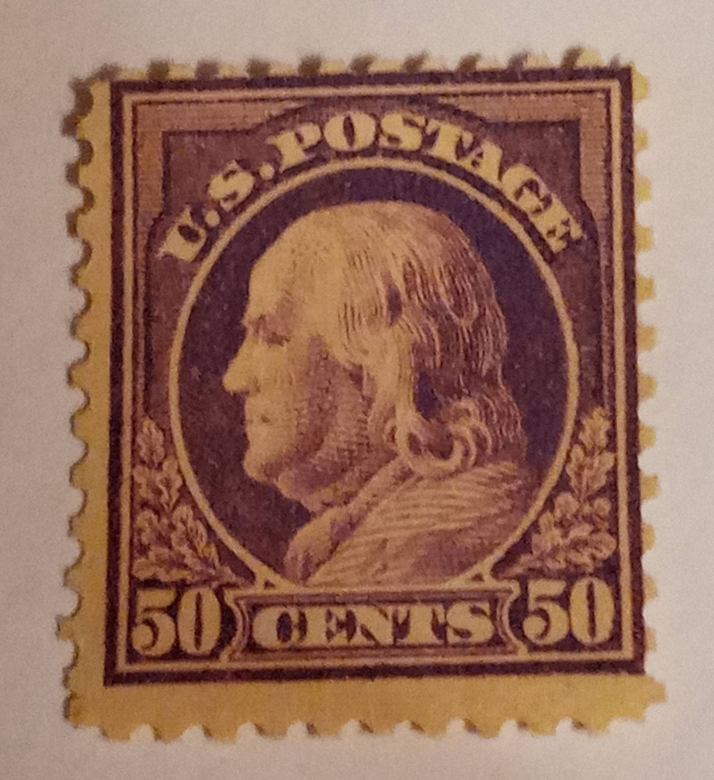 50 cent unused Franklin stamp that is perferated 11 with full gum