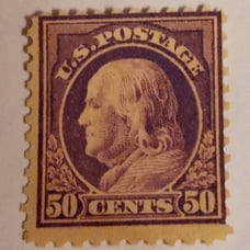 50 cent unused Franklin stamp that is perferated 11 with full gum
