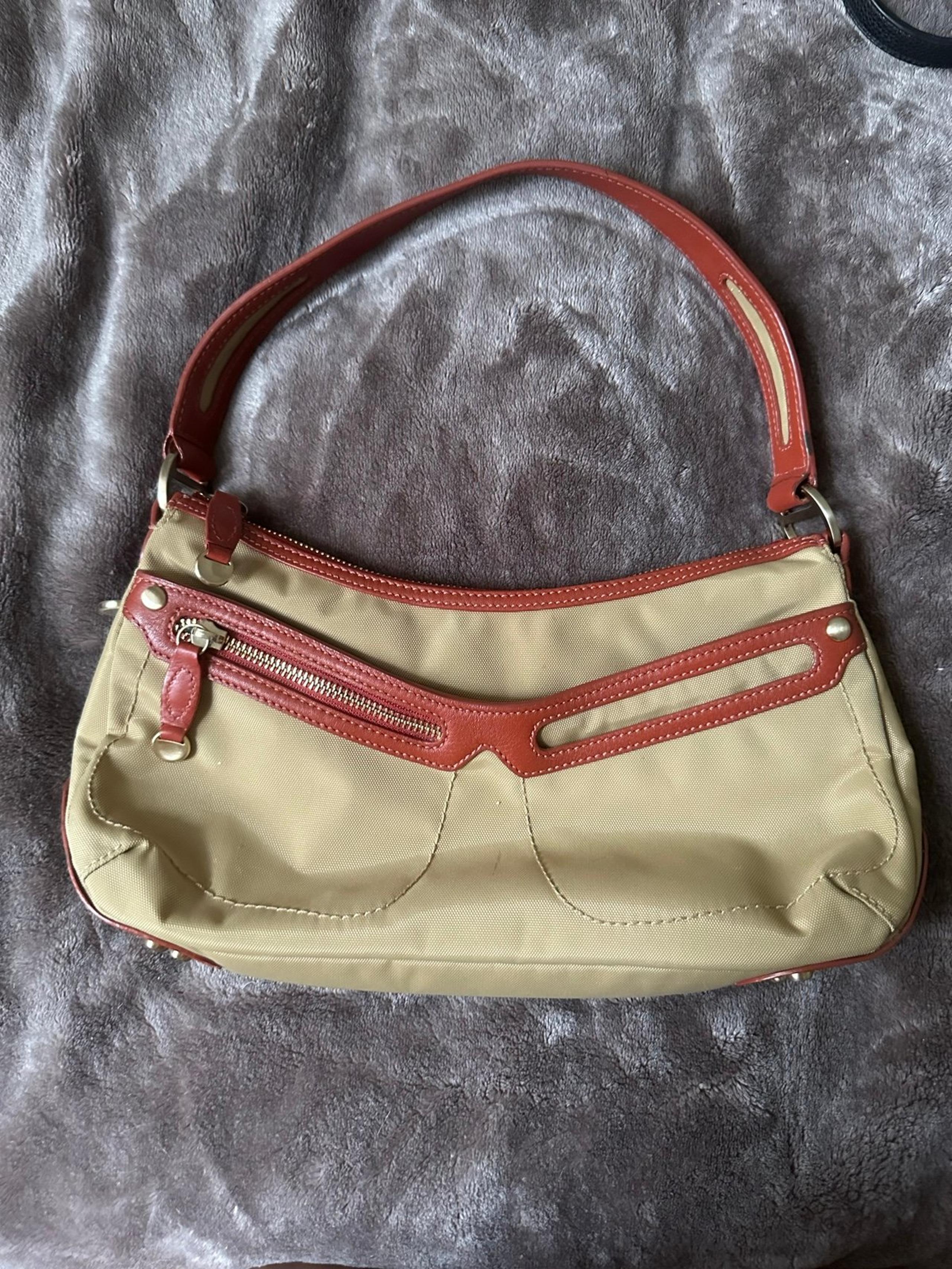 Sexy beige with red/orange outline
