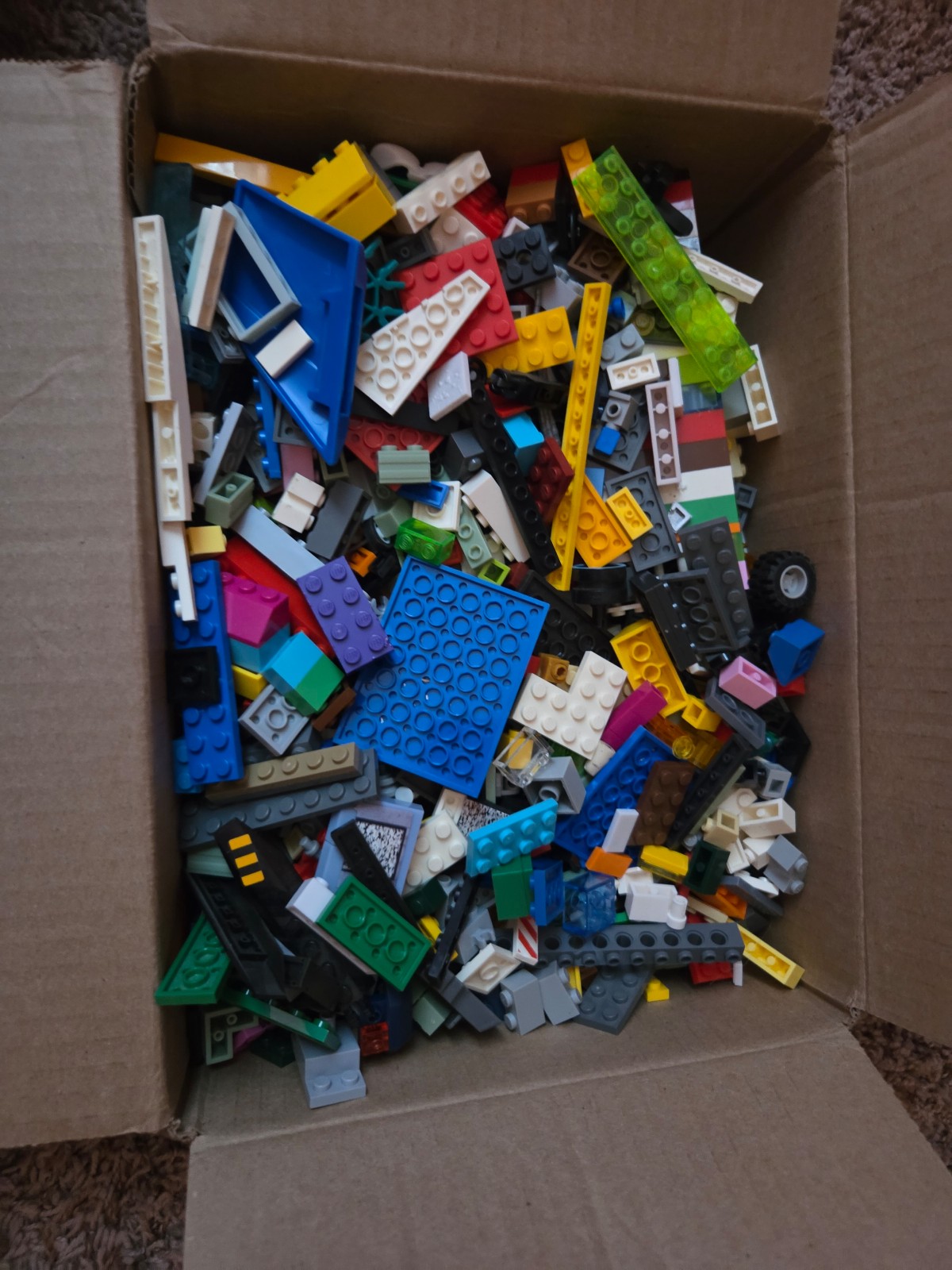 Box full of Lego pieces