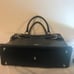 Elaine Turner black leather satchel purs