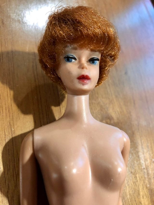 Vintage Titan Red Bubble cut Barbie doll with 2 outfits