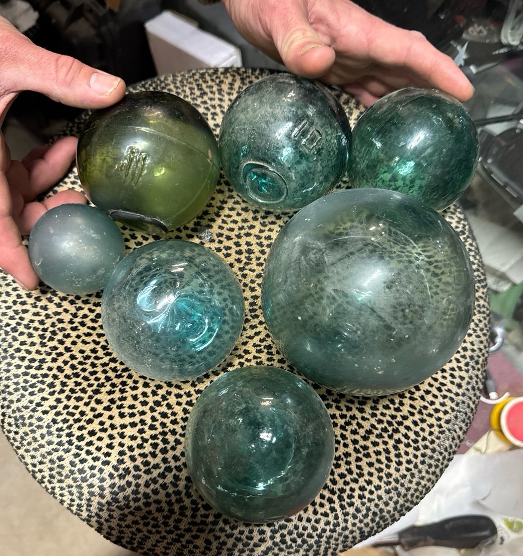 Vintage glass fishing bouy , sets of 7 “ different sizes some of # , very rare