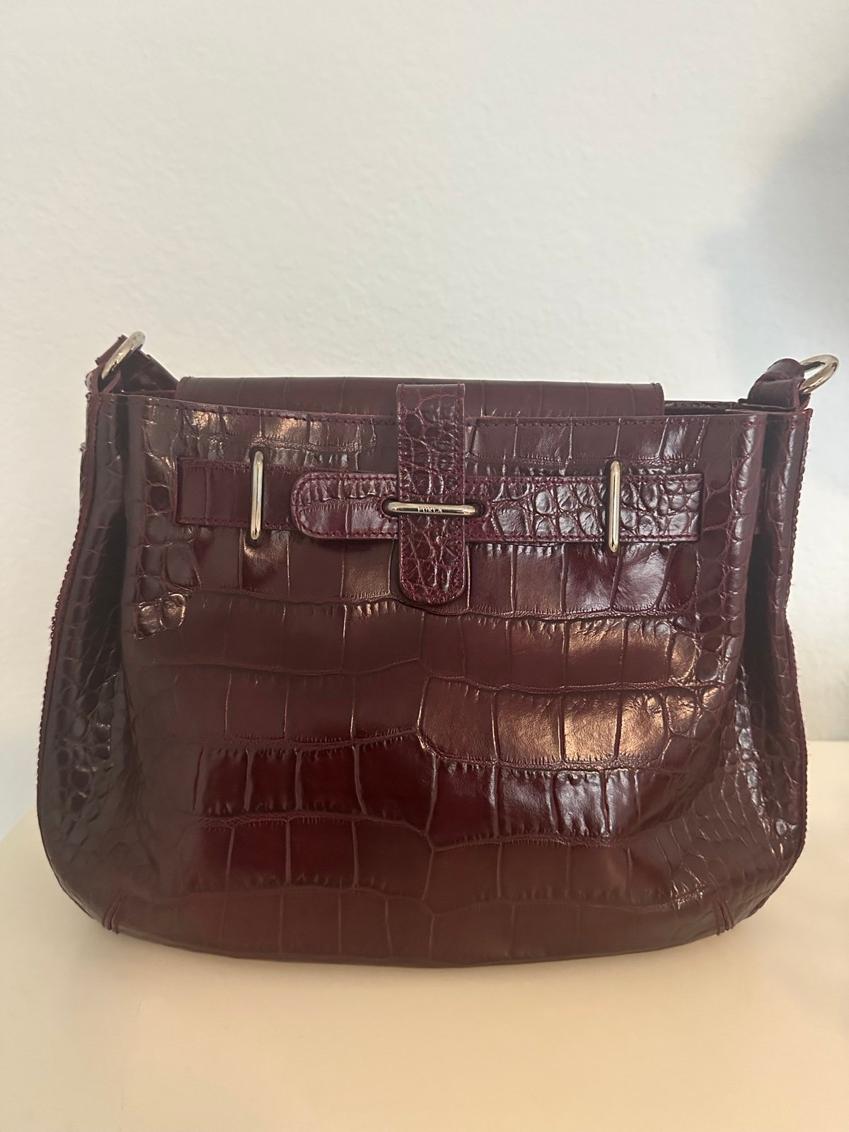 Furla burgundy color leather bag with silver hardware