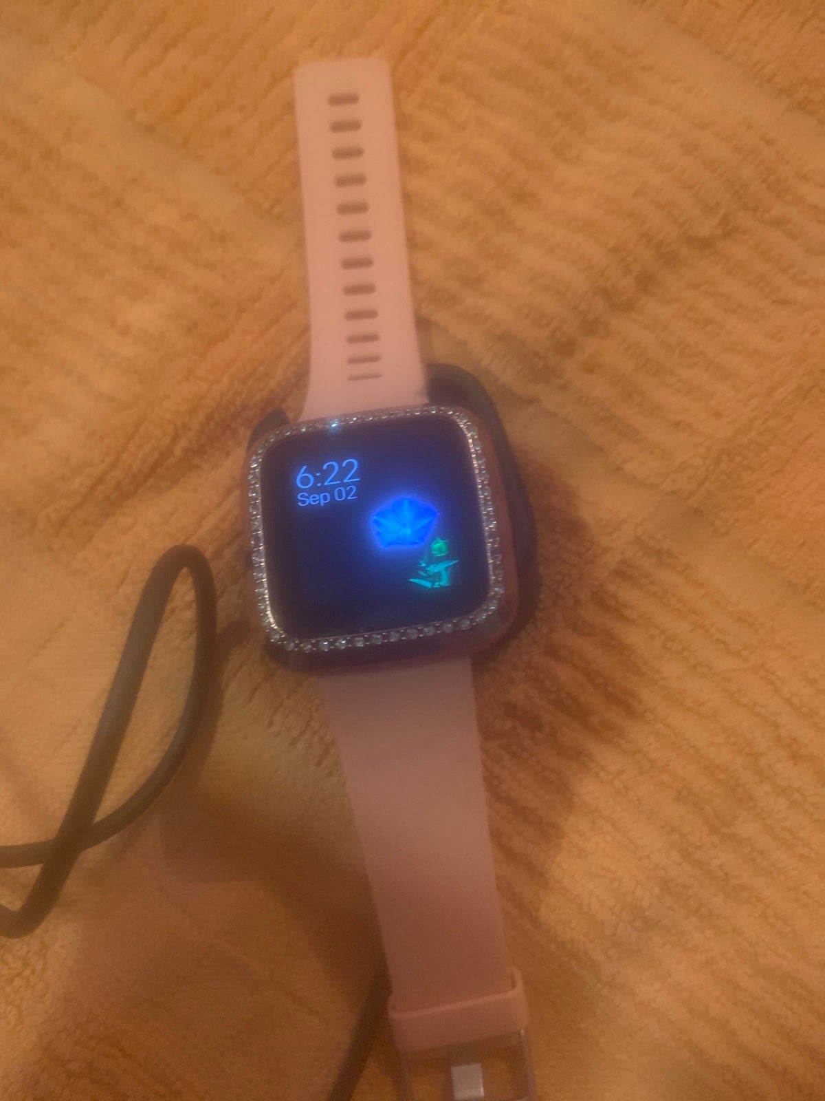 Fitbit Versa Smartwatch in Peach/Rose Gold