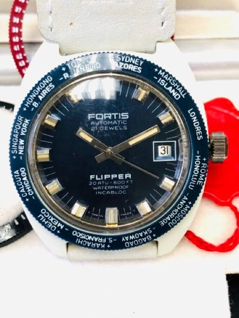 NEW OLD STOCK VINTAGE FORTIS FLIPPER IN ITS ORIGINAL BOX AND WITH ALL ITS BEZELS