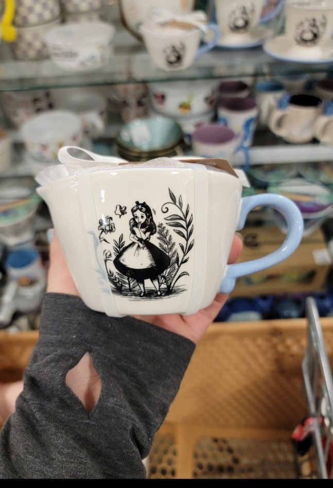 Brand new Rae dunn alice in wonderland measuring cup