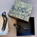 Dior holiday boxes with ribbons