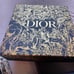 Dior holiday boxes with ribbons