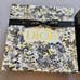 Dior holiday boxes with ribbons