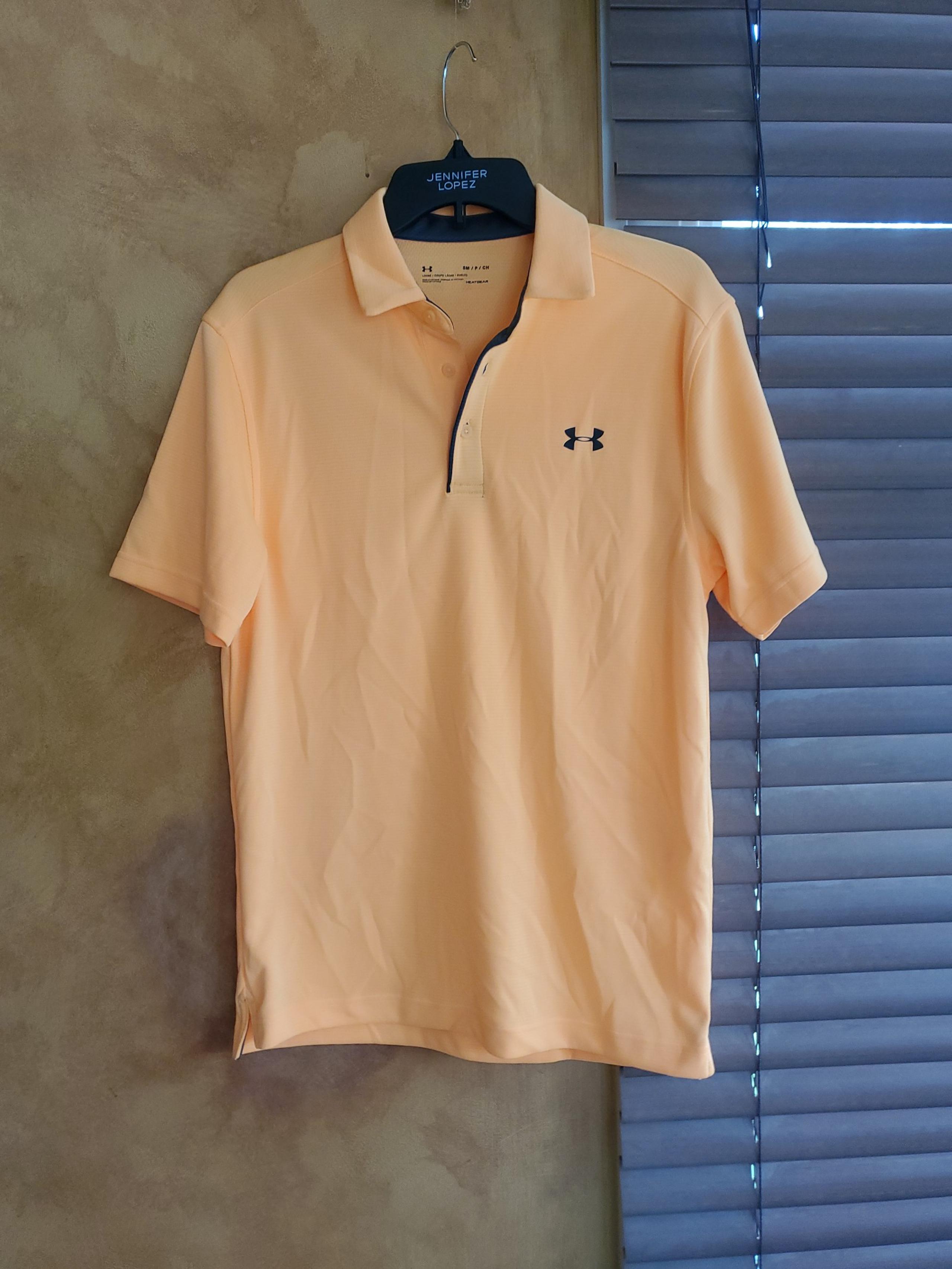 Classy Under Armour ladies Heatgear Polo shirt (size small)