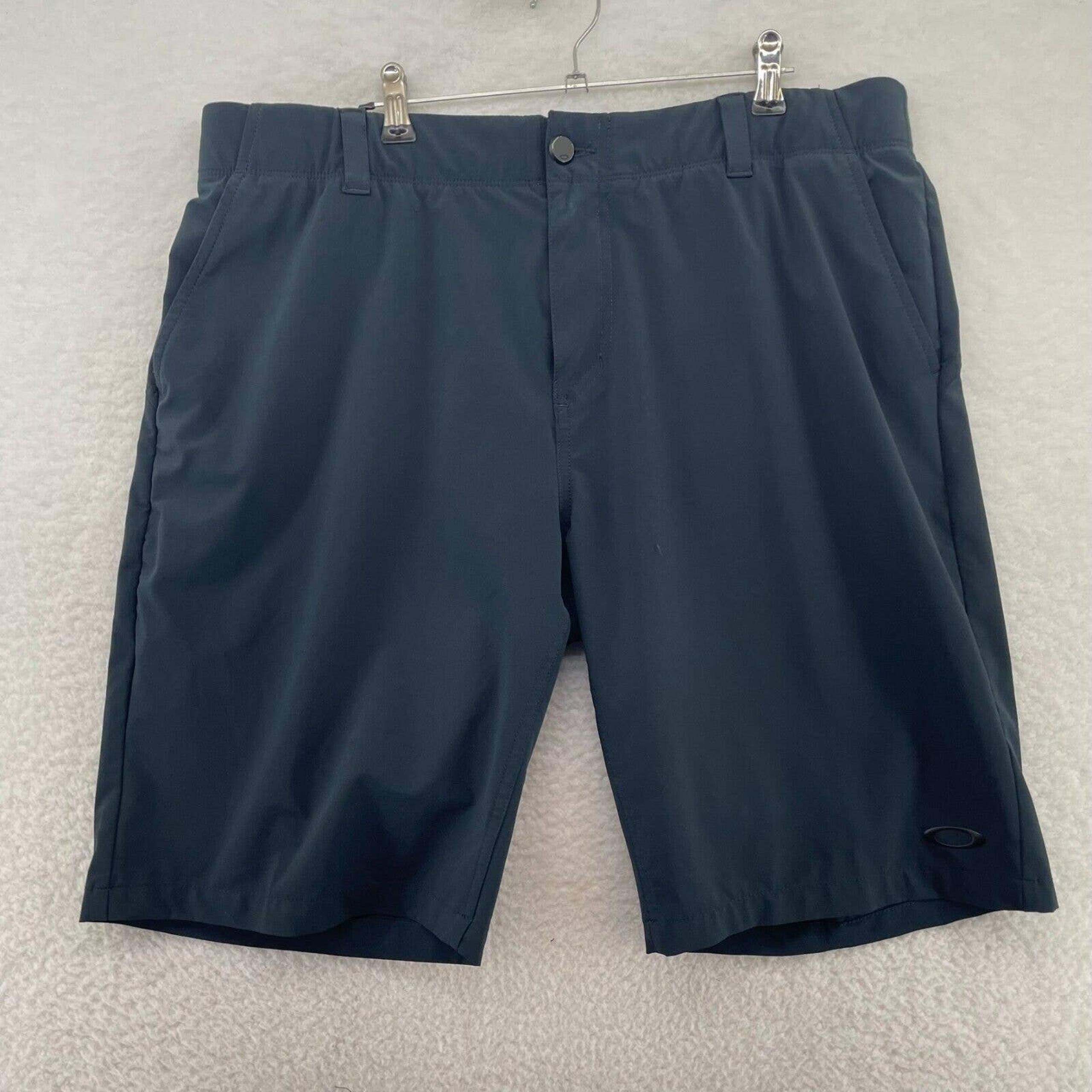 Oakley Mens Athletic shorts size 36 button front Blue outdoor stretch comfort
