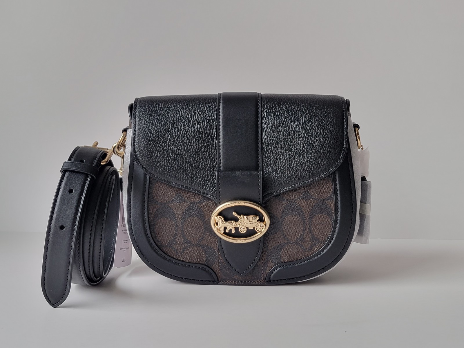 NWT Coach Georgie Saddle bag in Signature Canvas