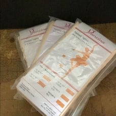 Footed tights by Dancina Three packs two pair each Please look at the size I don