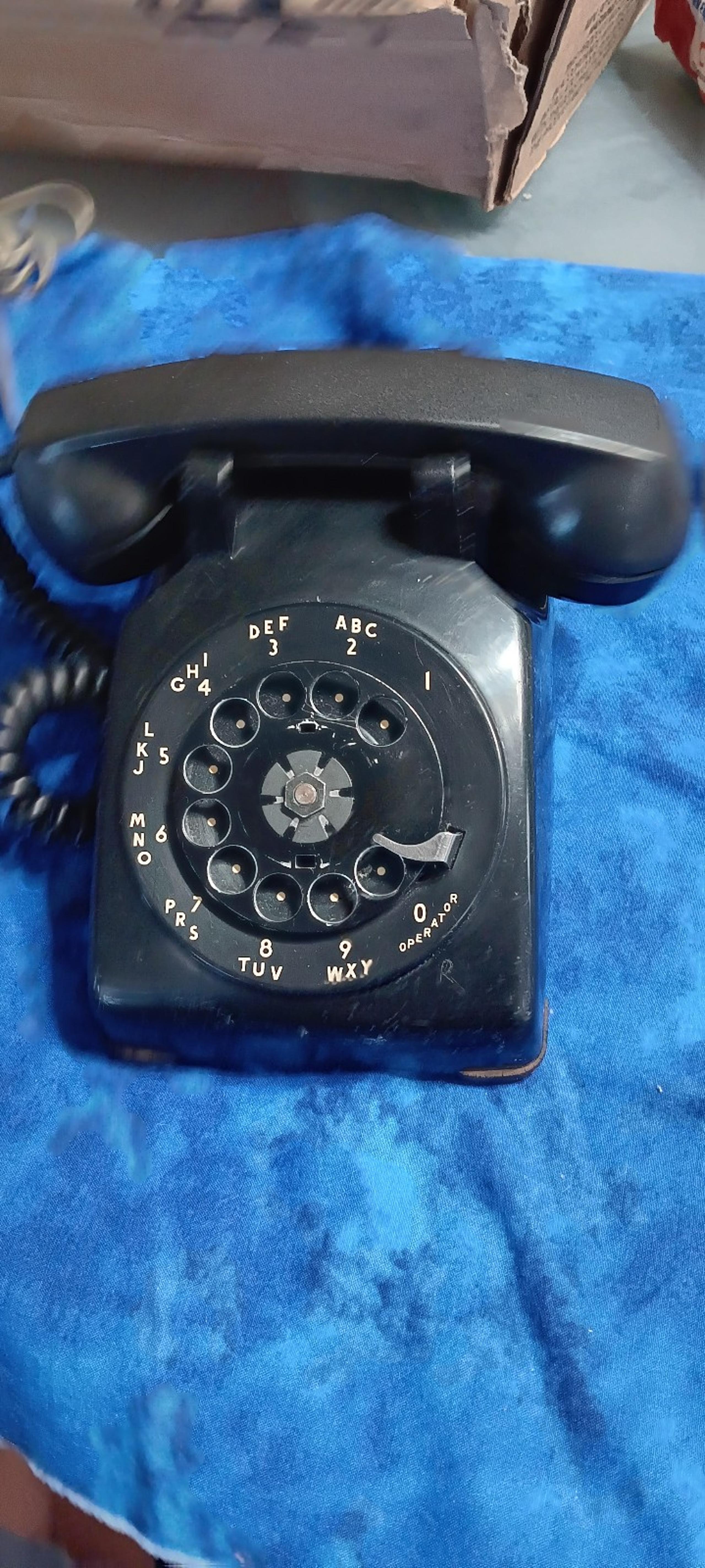 Vintage black dial phone