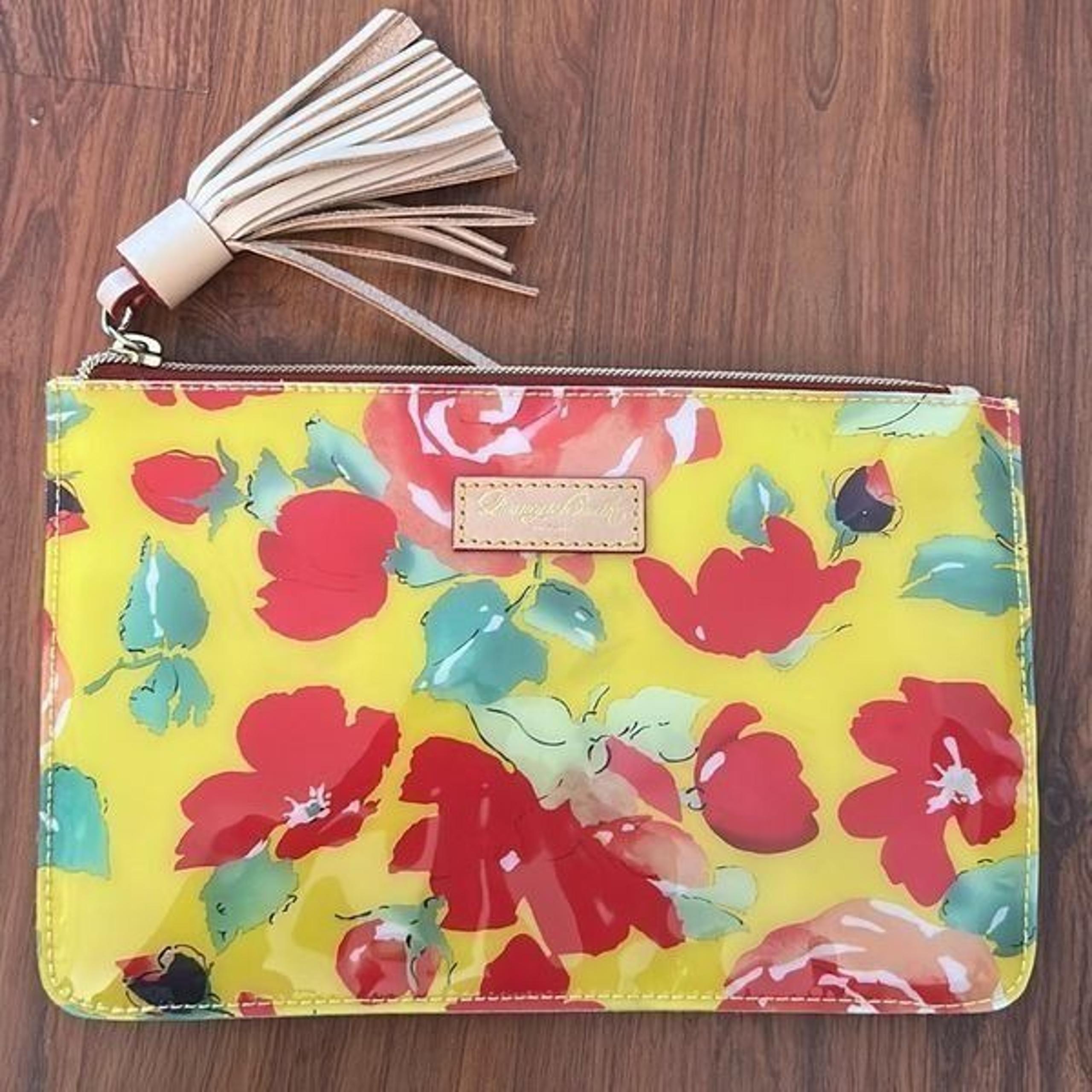 Dooney & Bourke floral pvc yellow clutch bag purse with tassel