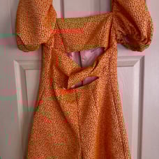 Autumn Adeigbo Orange Spot Liadan Floral Puff Sleeve Cutout Romper