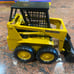 Ertl John Deere 569 Industrial loader Skid Steer 1/16 Diecast yellow Collectible