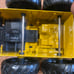 Ertl John Deere 569 Industrial loader Skid Steer 1/16 Diecast yellow Collectible
