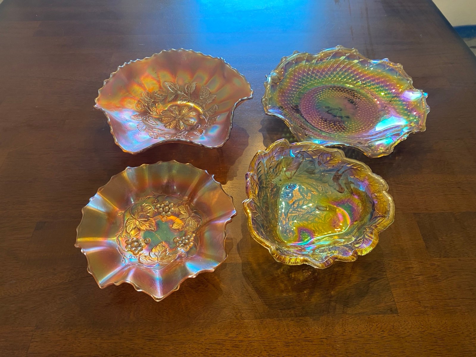 Orange carnival glass display plates.