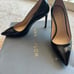 Stewart Weitzman black leather pumps