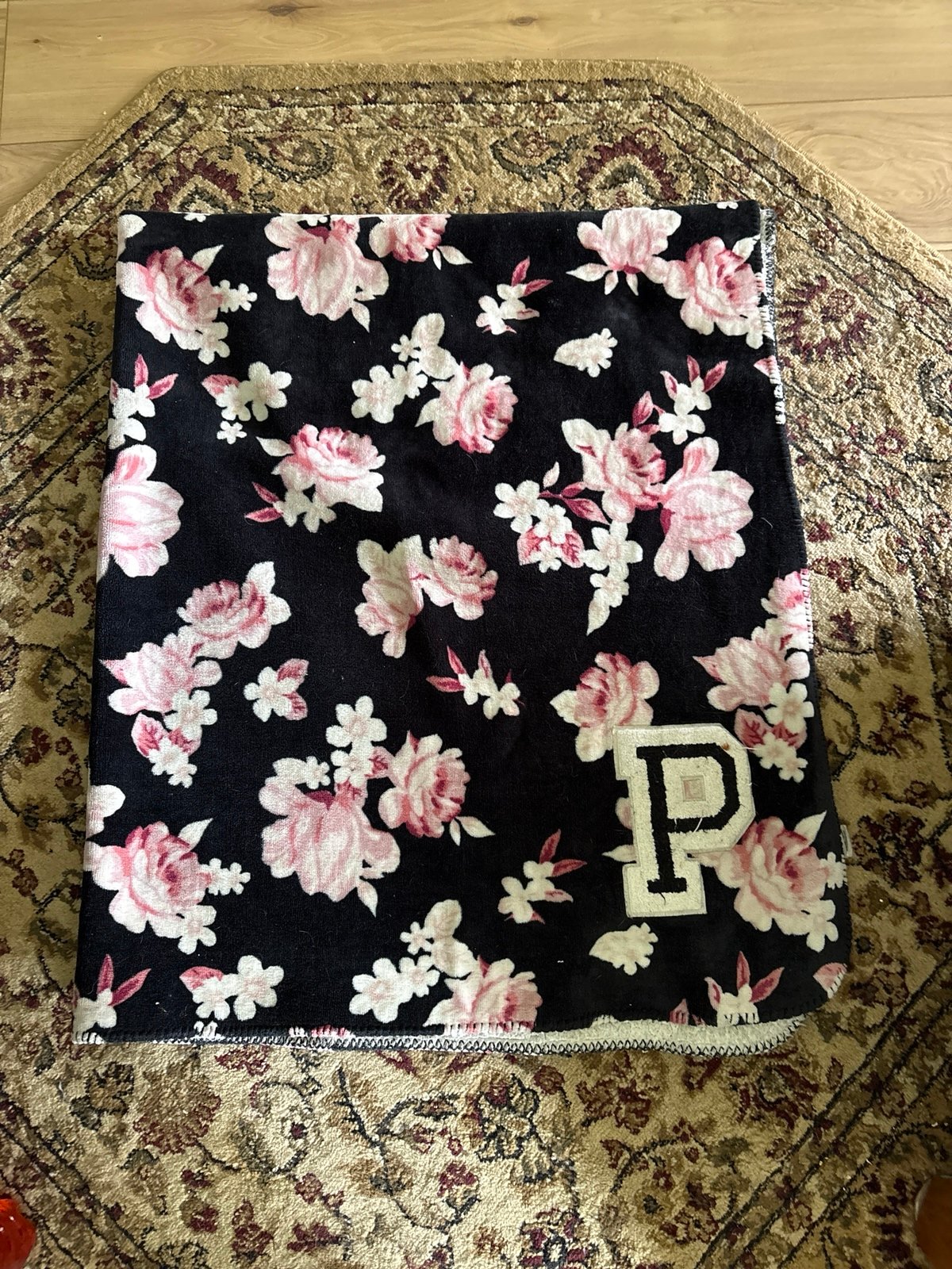 Limited edition/discontinued Victoria Secret floral blanket.