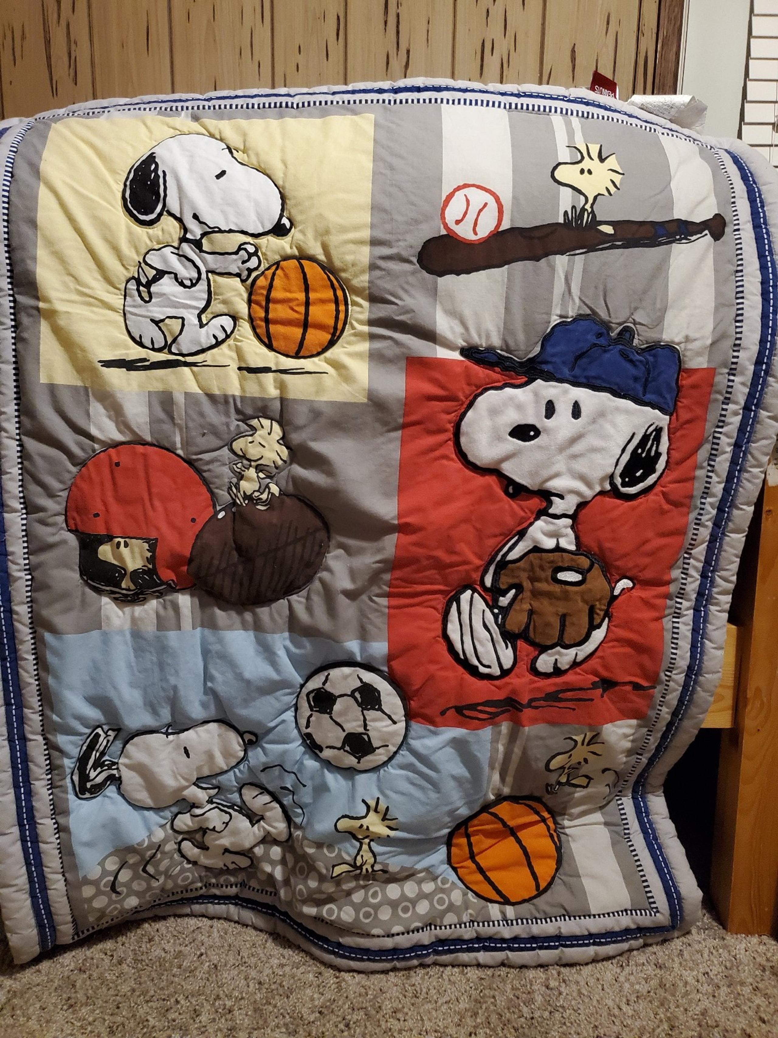 Snoopy™ Sports Gray/Blue/Yellow/Red Baby Crib Blanket