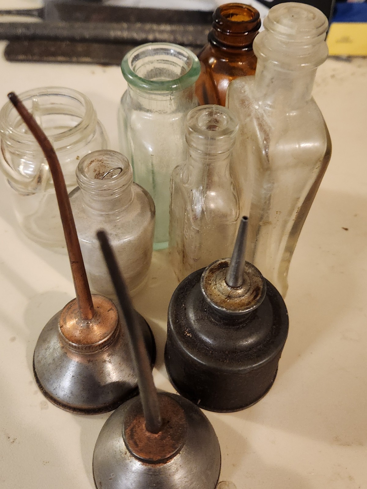Vintage bottles and oil cans