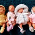 Four Cute little Ashton Drake Mini Dolls