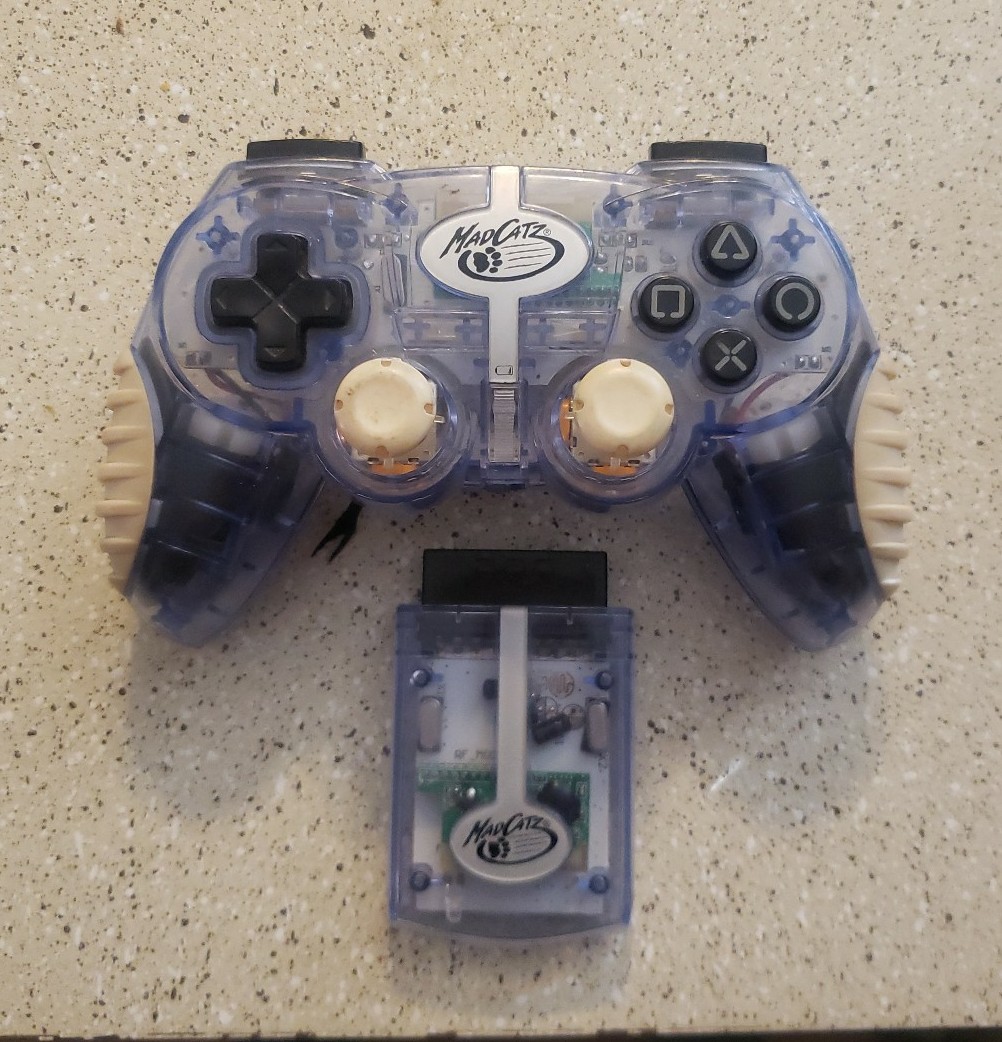 PS2 WIRELESS CONTROLLER (MAD CATZ)