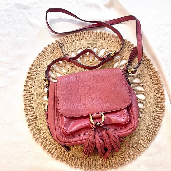 Oryany Mauve Pink Pebbled Leather Tassel Crossbody Bag