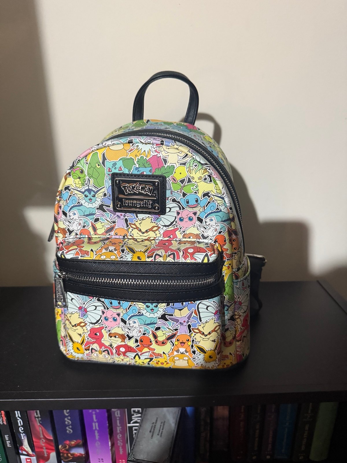 Multicolored Pokémon loungefly