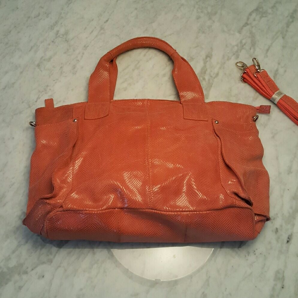 Unique salmon color leather handbag