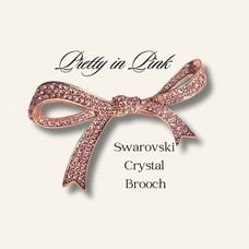 Vintage Swarovski Pink Bow Brooch covered in sparkling crystals