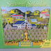 MB Puzzle Charles Wysocki Seasonal Splendor Wedding Day 1000 PC Americana