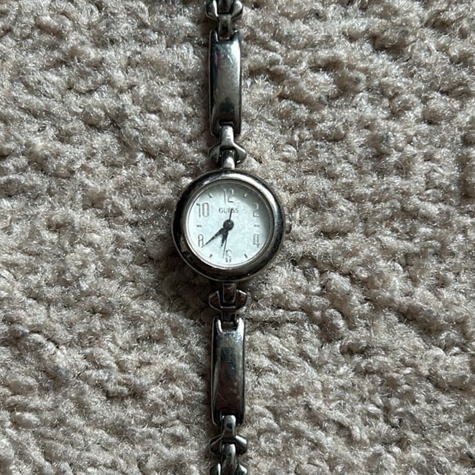 Guess women’s vintage dainty silver stainless steel bracelet watch