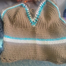 Light brown Crocheted halter top with white and teal accents