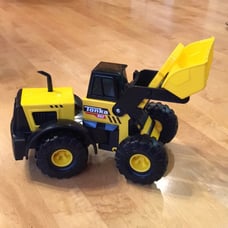 Tonka Steel Classics Front Loader features an articulated scooping bucket