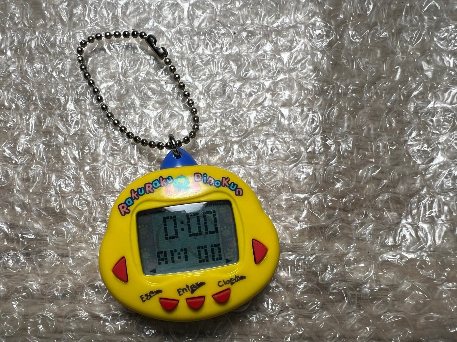 Tamagotchi Rakuraku Dinokun Dinkie Dino Virtual Pet Japanese Version