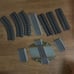 Various Lionel 2 4 and and Lionel 10 that rings when the train runs over it.