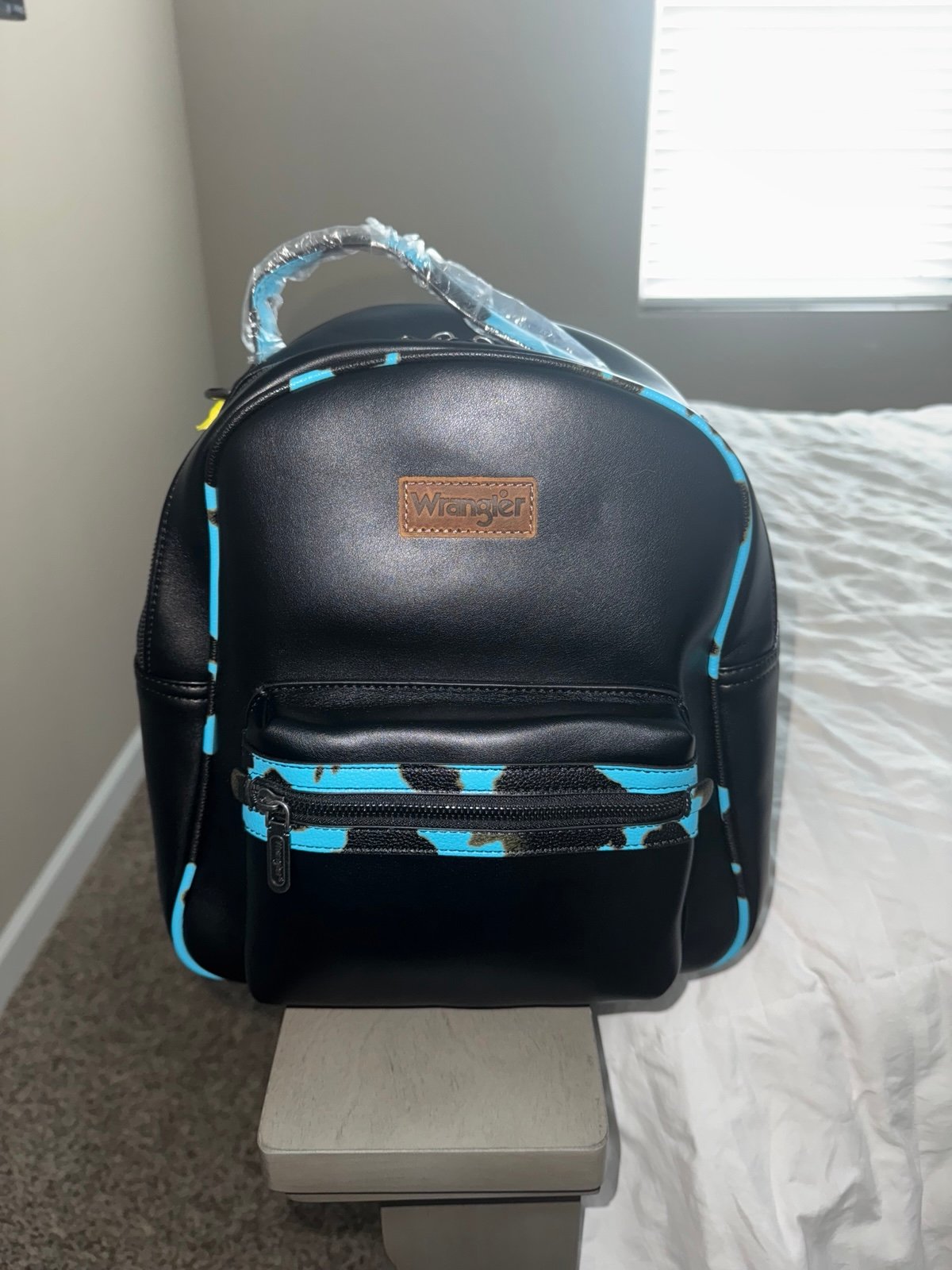 Wrangler Backpack: Turquoise Cowprint