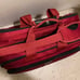 Ricardo Beverly Hills black and red 20x12x14 inch carry on shoulder bag luggage