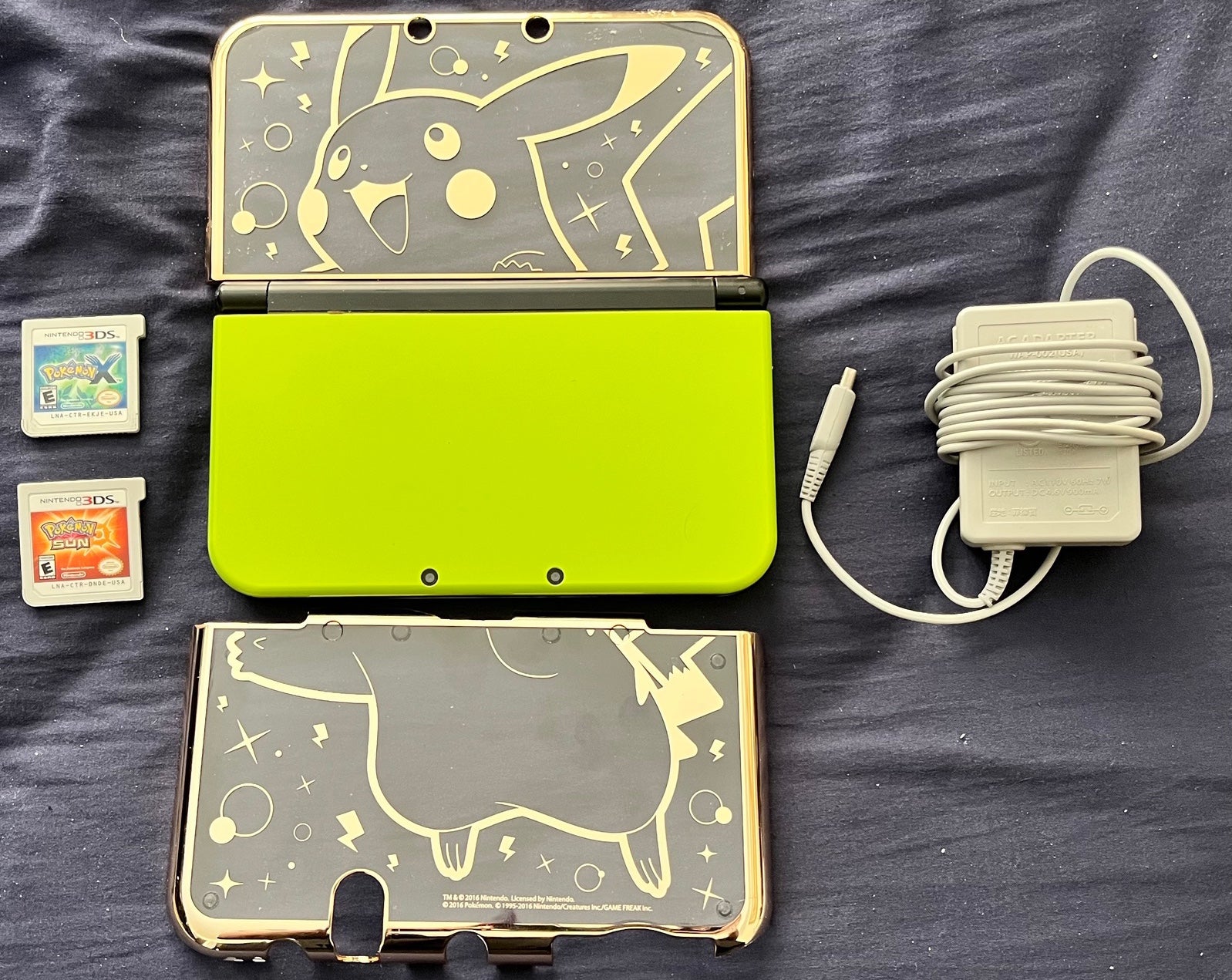 New 3DS XL Special Lime Green Edition w/ Official Pikachu Protector, two games
