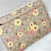 Coach Laptop Sleeve In Signature Canvas With Floral Cluster Print